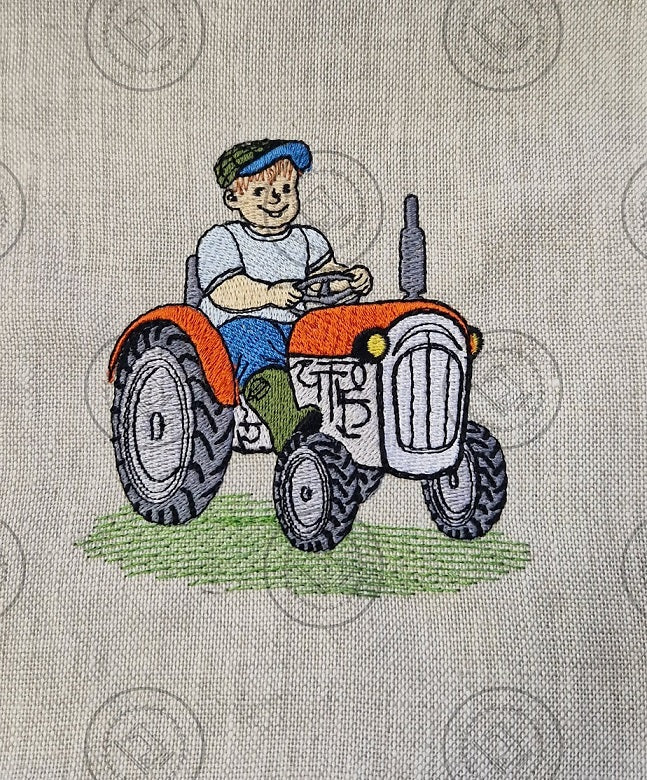 FARMER ON HIS TRACTOR Machine Embroidery Design